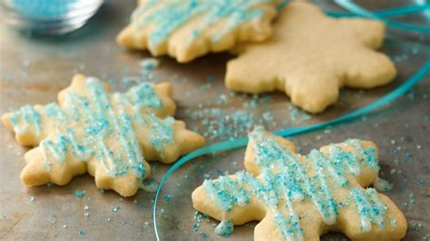 Roll out 1/8 inch thick and cut the cookies into desired shapes. Gluten-Free Christmas Sugar Cookies recipe from Betty Crocker