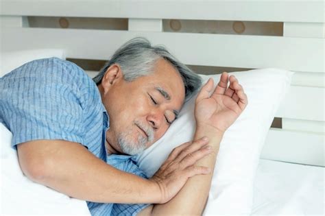 Premium Photo Senior Male Old Man Sleeping On The Pillow On White Bed