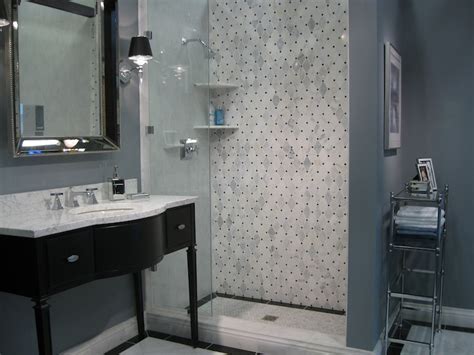 There's something about the luxe veiny stone that just makes a small utilitarian space and it doesn't have to be white, either. Black Washstand - Transitional - bathroom
