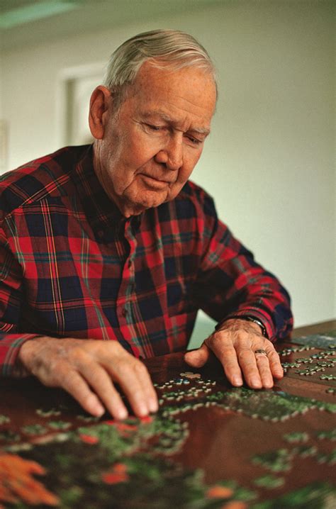 Jigsaw Puzzles As A Brain Exercise Senior Man Solving A Puzzle