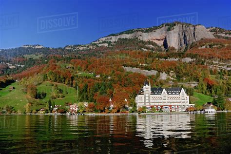 Hotel In Autumn Along Shore Of Lake Lucerne From Sightseeing Boat Lake