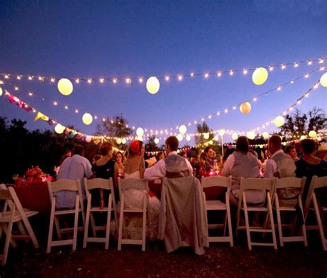 Chic backyard wedding reception ideas with lights. unique outdoor wedding lighting | Sang Maestro