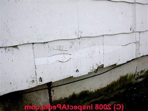 Look for asbestos markings on the roofing or siding material or the packages in which they came, or call the manufacturer. Photos asbestos siding
