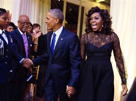 Michelle obama is a man? Michelle Obama in Print Blouse and Pants at Clinton Rally ...
