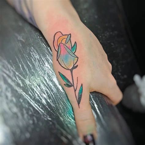 When you look at various picture designs, you can see how these artists have gone above and beyond the regular picture design. Coloured rose bud tattoo on hand tattoo by Jimmy in 2021 ...