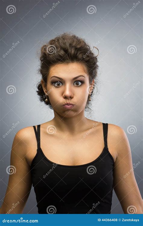 Woman With Puffing Out Ones Cheeks Stock Photo Image 44366408