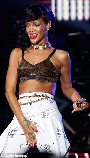 Rihanna Gyrates In Leopard Print Bra As She Takes To The Stage In