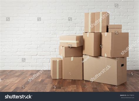 Moving Stack Cardboard Boxes Empty Room Stock Photo Edit Now 454178074