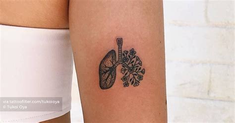 Floral Lungs Tattoo On The Tricep