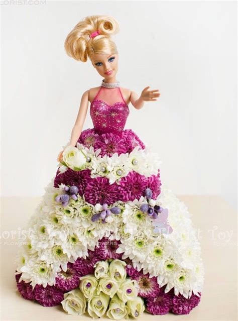 A Barbie Doll In A Dress Made Out Of Flowers