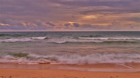 Beautiful Ocean Waves Beach Sand Under White Black Clouds Sky 4k 5k Hd Ocean Wallpapers Hd