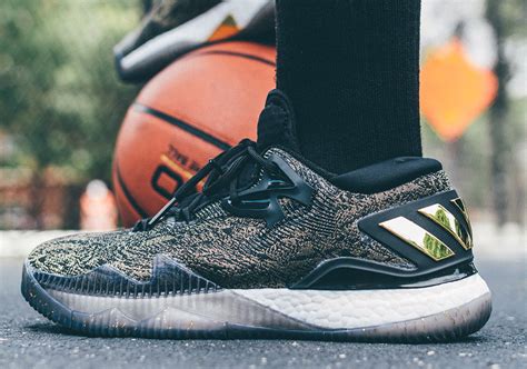 This adidas ultra boost features a black primeknit upper, matching cage overlay and heel counter atop a solid. adidas Crazylight Boost 2016 James Harden Black Gold - SBD