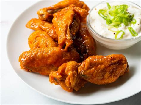 Arrange the chicken wings on a baking sheet. Keto-Friendly Crispy Baked Buffalo Chicken Wings | Working ...
