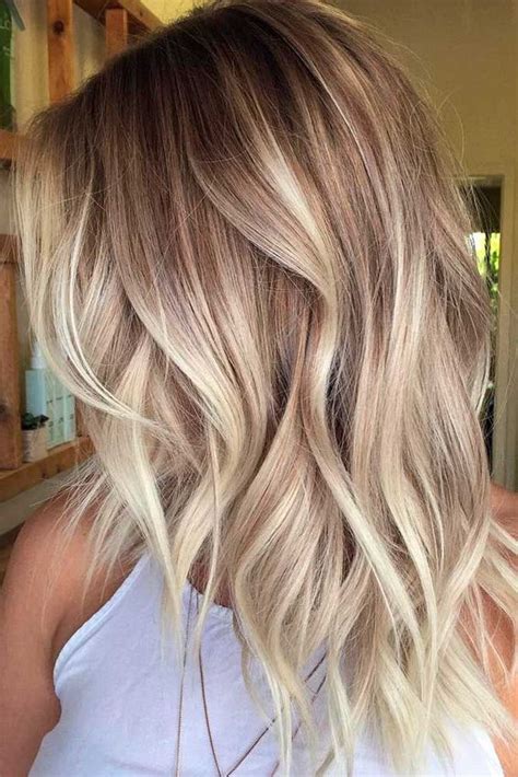 Hailey baldwin is a showstopper with this hair color. Picture Of blonde balayage on wavy layered chestnut hair ...