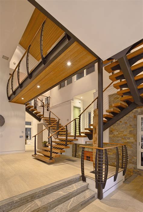 The stair tread depth section (r311.5.3.2) of the building code prescribes the minimum tread depth shall be 10, and the treads shall vary by not more has anyone faced this? Grand Entry Mono Stringer Stair - Candlewood Lake, CT ...