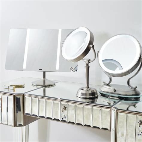 In proportion ratios, your mirror shouldn't be taller than your vanity. Cordless LED Height Adjustable Rechargeable Vanity Mirror