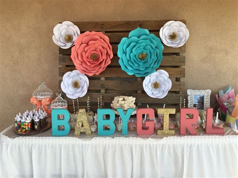The decorations paper rosettes and vinyl sign cut out in my cutter. Diy paper flowers coral and teal babyshower Babygirl ...