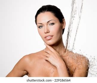 Стоковая фотография 229186564 Beautiful Naked Woman Wet Body Splashes