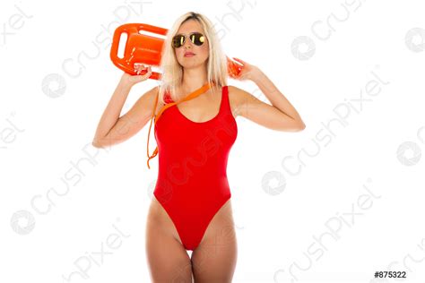 Pretty Young Blonde Lifeguard In Red Sexy Swimsuit With Lifeguard