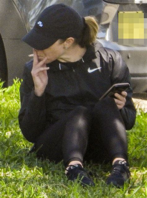 Kate Ritchie Looks Downcast As She Sits Alone Smoking A Cigarette Without Her Wedding Ring