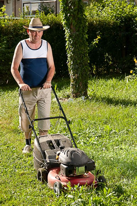 Man Mowing The Lawn High Quality People Images Creative Market