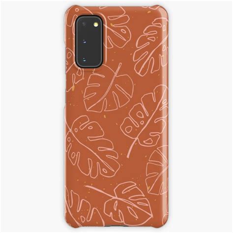 An Orange And White Phone Case With Leaves On It Samsung S10 Plus Cases