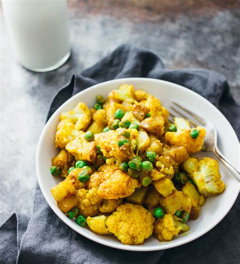 Golden Cauliflower Curry With Potatoes Food And Drink