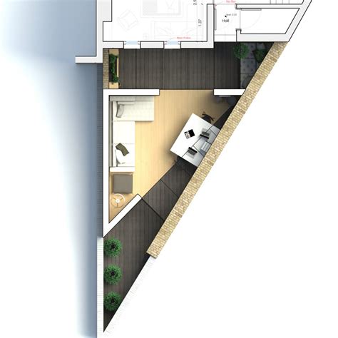 A city house on a triangular lot. The Triangle | Backyard Study Extension in Hackney