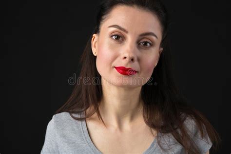 Portrait Of Beautiful Young Brunette Woman With Red Lips And Evening