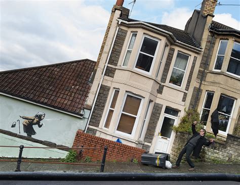 Aachoo A Sneezing Pensioner Knocks Down A Row Of Houses In New Banksy