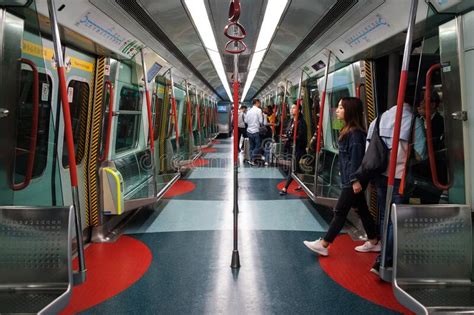 People Travel Inside Metro Mtr Subway Train In Hong Kong Editorial