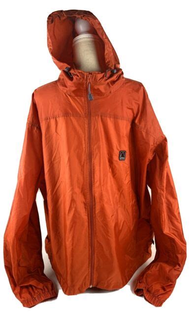 Sierra Designs Adult Packable Rain Jacket Burnt Orange Includes Bag