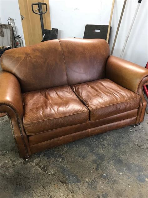 Laura Ashley Chestnut Brown Small Leather Sofa In Basildon Essex