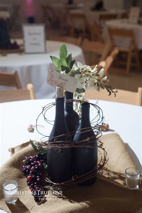 Love This Wine Bottles Grapes And Twig Centerpiece Idea For A Wine