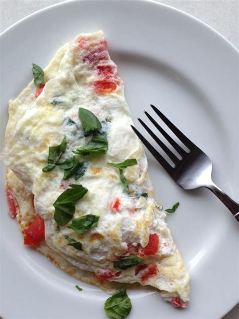 Egg White Omelet With Tomatoes Feta Basil And Hummus So Stinkin