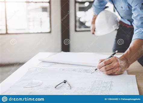 Construction Concept Hands Of Architect Or Engineer Working For Stock
