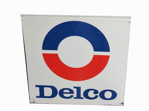 Addendum Item Late 1960s 70s Delco Tin Sign