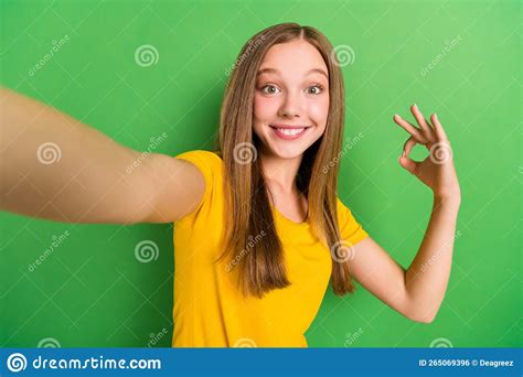 Selfie Closeup Photo Of Smiling Cute Teenager Showing Okey Sign