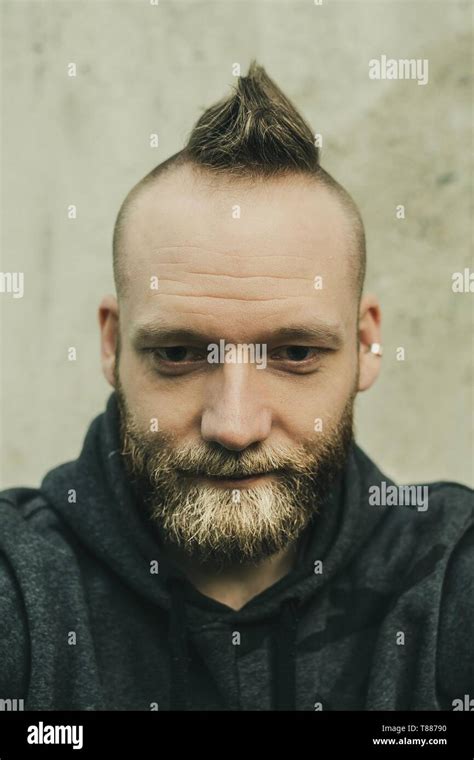 Smiling Dude In Close Up Looking Down Stock Photo Alamy