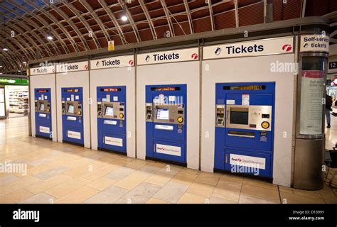 Row Of Fast Ticket Machines At Paddington Railway Station London