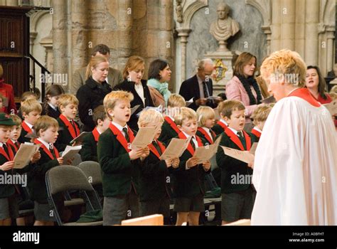 School Boys Singing Hymn At A Church Service In Westminster Abbey