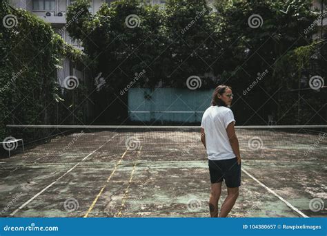 Man Standing In A Tennis Court Stock Image Image Of Handsome Alone