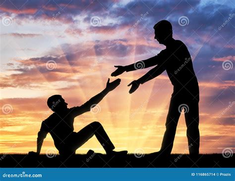 Silhouette Of A Man Giving A Helping Hand To Another Man Who Fell To