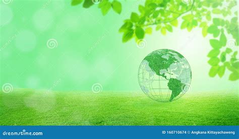 Green Planet Earth Globe With Green Trees In Background Stock Photo