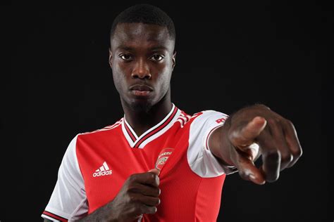 nicolas pepe in pictures arsenal club record signing poses in kit after £72m move from lille