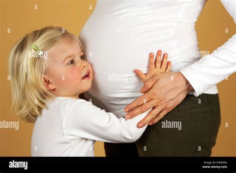 Child With Pregnant Baby Bump Stock Photo Alamy