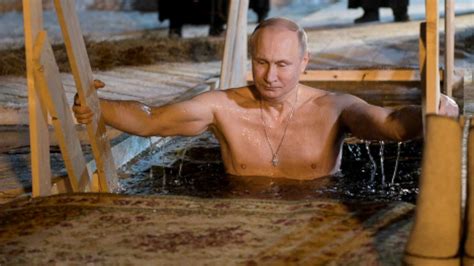 shirtless vladimir putin takes dip in icy russian lake for the epiphany abc news