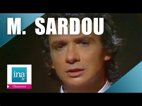 Intéressé(e) par l'explication des paroles de cette chanson ou d'autres ? Michel Sardou "En chantant" (live officiel) - Archive ...
