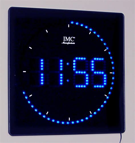 Led Wall Clock With Blue Numbers And Round Seconds Display
