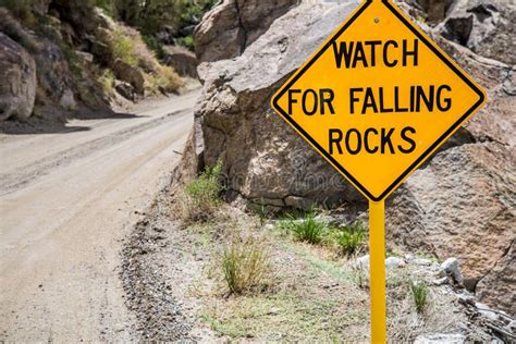 Falling Rocks Danger Warning Road Sign Stock Photo Image Of Road